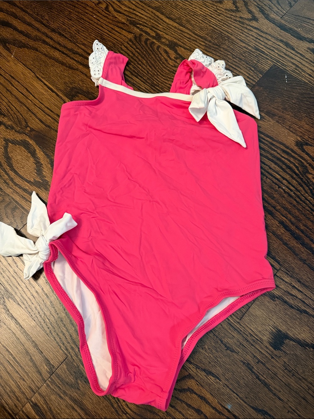 The Beaufort Bonnet Company Pink Kids One-Piece Swimsuit with White Bows